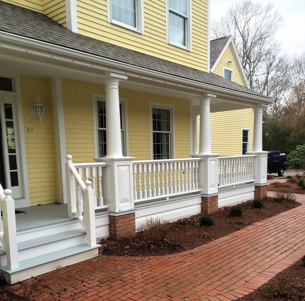 Large classic front porch idea in Providence with a roof extension by J. M. Bryson Construction Management Inc. | Outdoor Photos | Porch | Landscaping | Landscape Design | Outdoor Living Space | Porch Design Ideas | Outdoor Living Space Ideas | Backyard Design