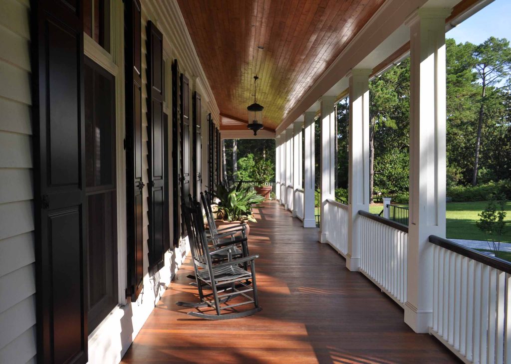 Large classic porch idea in Atlanta with decking and a roof extension by Frederick + Frederick Architects | Outdoor Photos | Porch | Landscaping | Landscape Design | Outdoor Living Space | Porch Design Ideas | Outdoor Living Space Ideas | Backyard Design