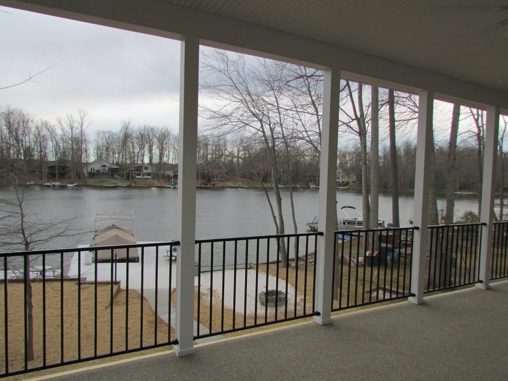 Large classic screened-in back porch idea in Other with a roof extension by Design Craft Homes Inc | Outdoor Photos | Porch | Landscaping | Landscape Design | Outdoor Living Space | Porch Design Ideas | Outdoor Living Space Ideas | Backyard Design