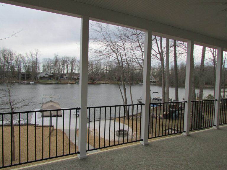 Large classic screened-in back porch idea in Other with a roof extension by Design Craft Homes Inc | Outdoor Photos | Porch | Landscaping | Landscape Design | Outdoor Living Space | Porch Design Ideas | Outdoor Living Space Ideas | Backyard Design