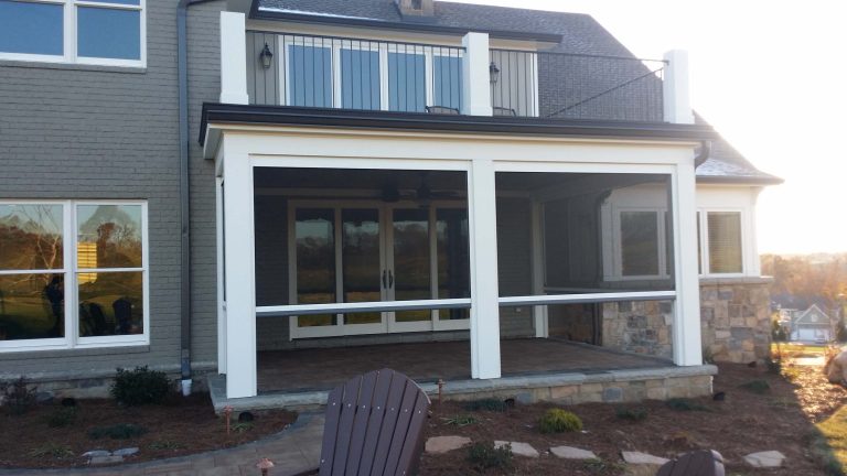 Large classic stone screened-in back porch idea in Louisville with a roof extension by Screens of Kentucky, LLC | Outdoor Photos | Porch | Landscaping | Landscape Design | Outdoor Living Space | Porch Design Ideas | Outdoor Living Space Ideas | Backyard Design