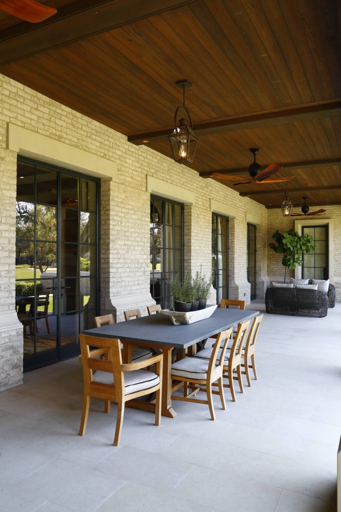 Large classic tile back porch idea in Tampa with a roof extension by Jones Architecture | Outdoor Photos | Porch | Landscaping | Landscape Design | Outdoor Living Space | Porch Design Ideas | Outdoor Living Space Ideas | Backyard Design