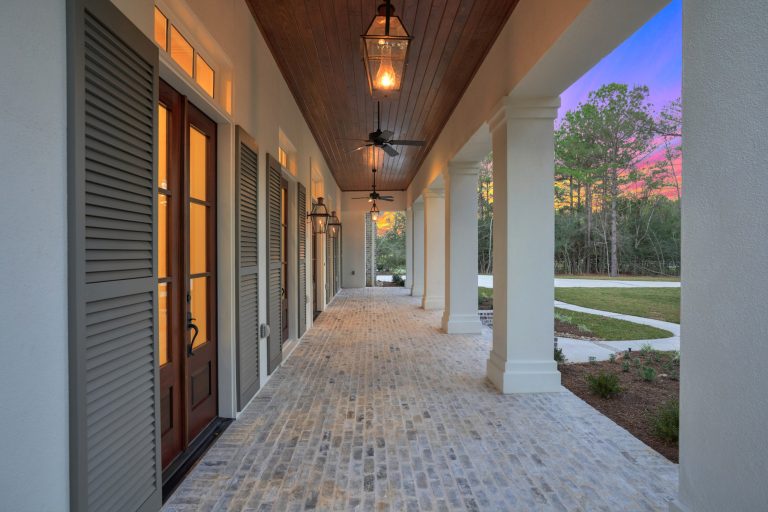 Large cottage brick porch photo in Houston with a roof extension by Wyrick Residential Design | Outdoor Photos | Porch | Landscaping | Landscape Design | Outdoor Living Space | Porch Design Ideas | Outdoor Living Space Ideas | Backyard Design