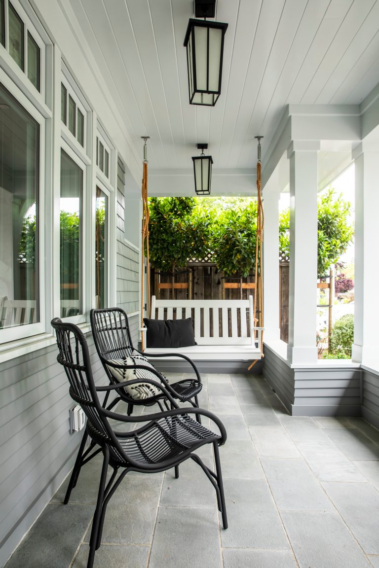 Large cottage stone wood railing front porch idea in San Francisco with a roof extension by Fiorella Design | Outdoor Photos | Porch | Landscaping | Landscape Design | Outdoor Living Space | Porch Design Ideas | Outdoor Living Space Ideas | Backyard Design