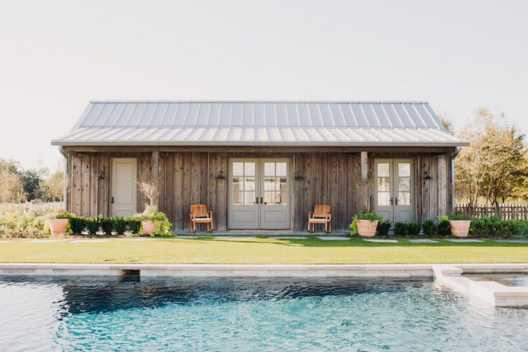 Large country pool photo in Dallas