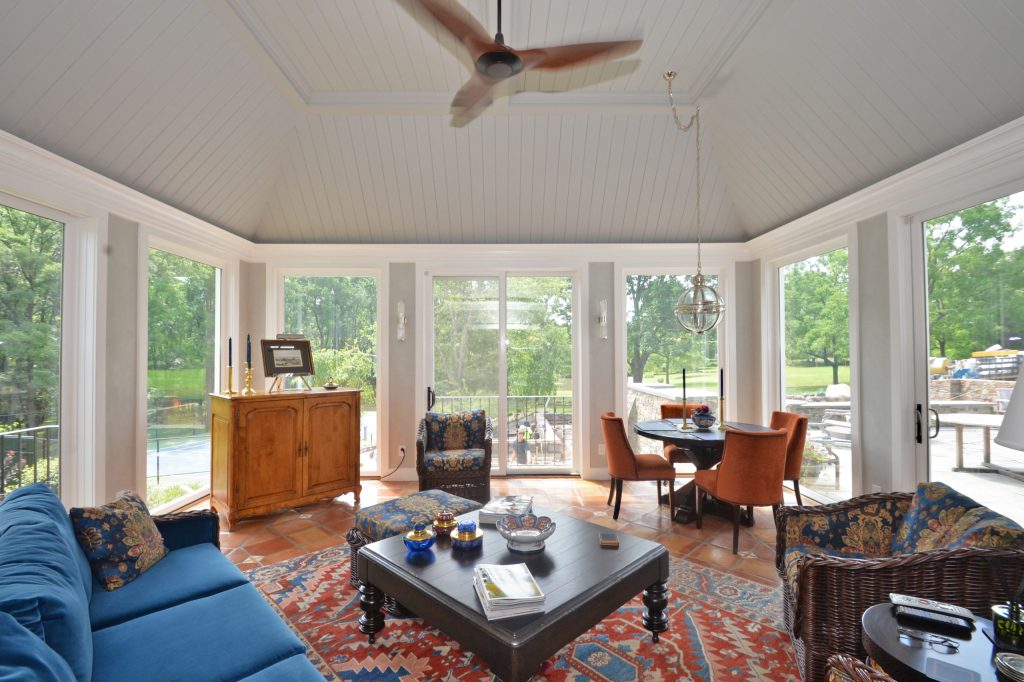 Large country tile screened-in back porch idea in New York with a roof extension by John Gehri Zerrer | Outdoor Photos | Porch | Landscaping | Landscape Design | Outdoor Living Space | Porch Design Ideas | Outdoor Living Space Ideas | Backyard Design