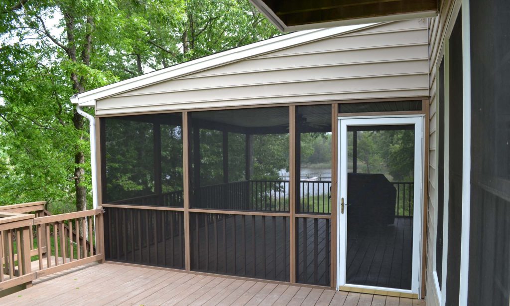 Large elegant backyard deck photo in DC Metro with a roof extension