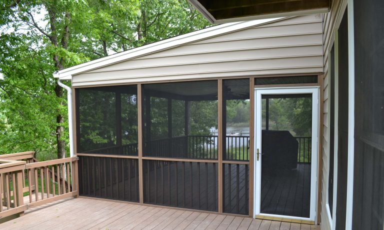 Large elegant backyard deck photo in DC Metro with a roof extension