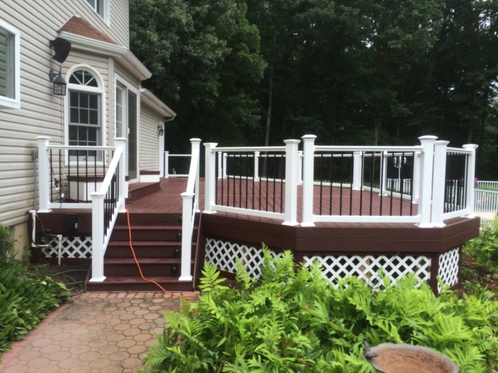 Large elegant backyard deck photo in New York with no cover
