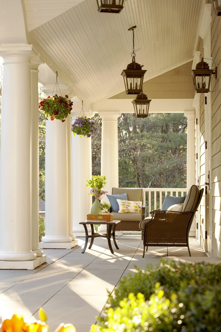 Large elegant concrete paver front porch photo in Boston with a roof extension by Oak Hill Architects | Outdoor Photos | Porch | Landscaping | Landscape Design | Outdoor Living Space | Porch Design Ideas | Outdoor Living Space Ideas | Backyard Design