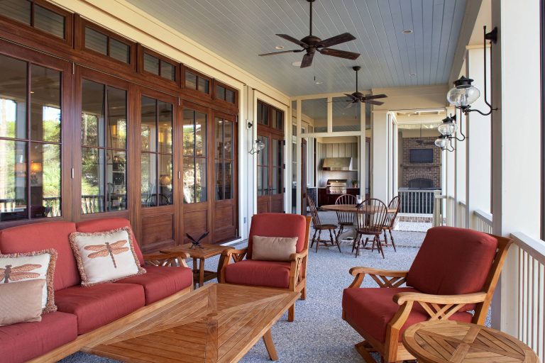 Large elegant porch photo in Charleston by Court Atkins Group | Outdoor Photos | Porch | Landscaping | Landscape Design | Outdoor Living Space | Porch Design Ideas | Outdoor Living Space Ideas | Backyard Design