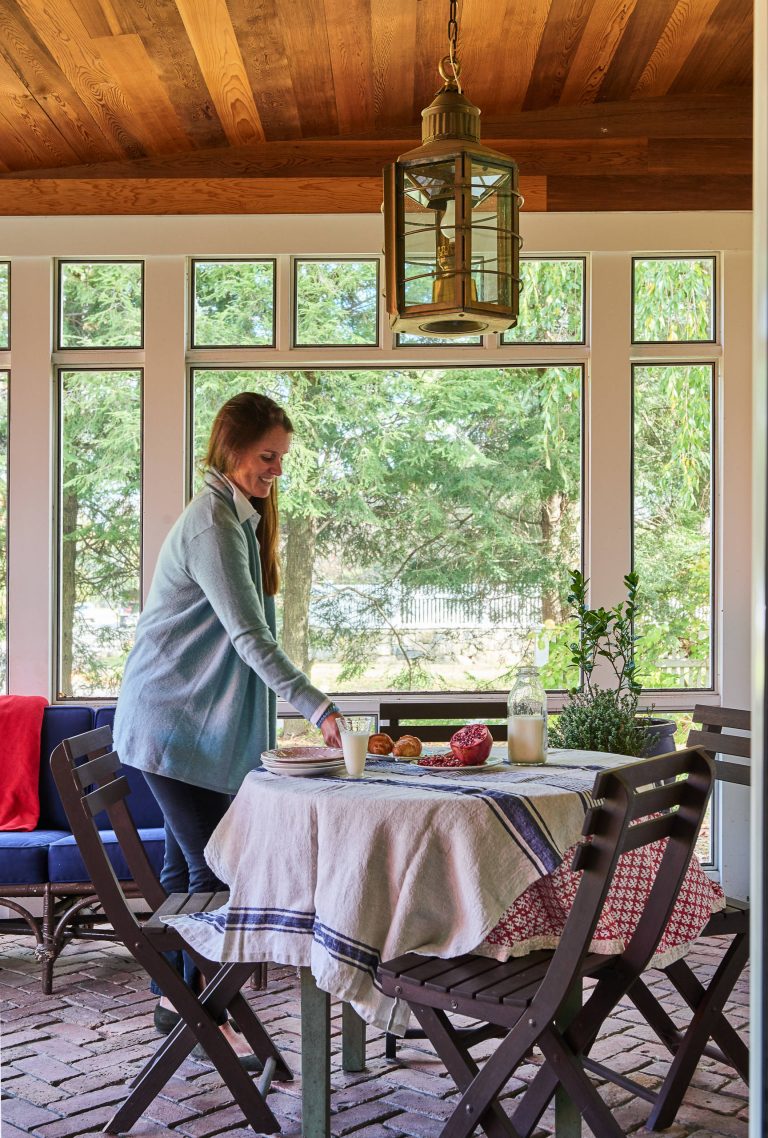 Large farmhouse brick screened-in front porch idea in New York with a roof extension by Renaissance Partners, LLC | Outdoor Photos | Porch | Landscaping | Landscape Design | Outdoor Living Space | Porch Design Ideas | Outdoor Living Space Ideas | Backyard Design