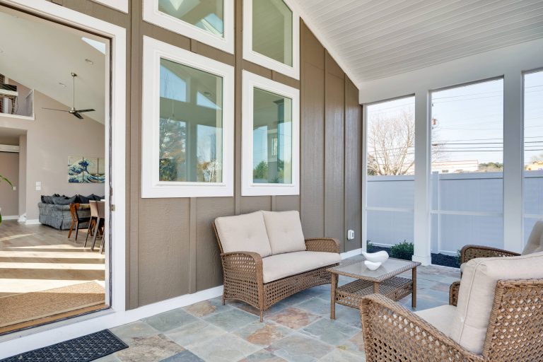 Large farmhouse tile screened-in back porch idea in Other with a roof extension by CRx - The Cure for the Common Build | Outdoor Photos | Porch | Landscaping | Landscape Design | Outdoor Living Space | Porch Design Ideas | Outdoor Living Space Ideas | Backyard Design