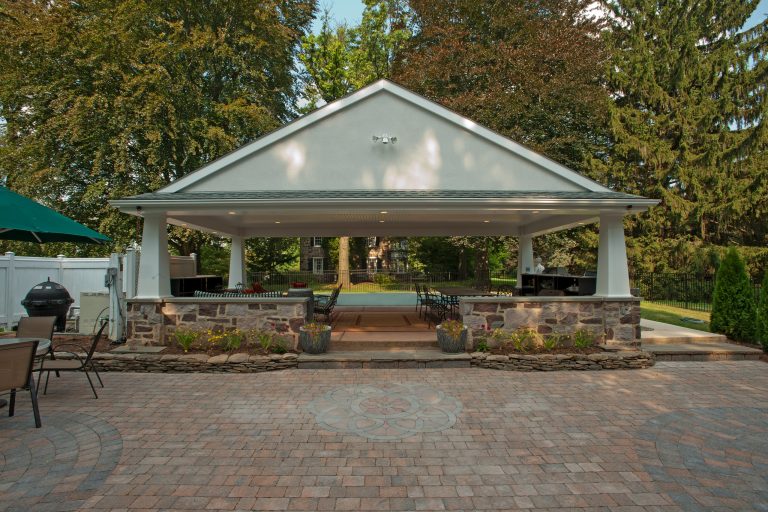 Large, free-standing open-air covered patio with Mediterranean accents.