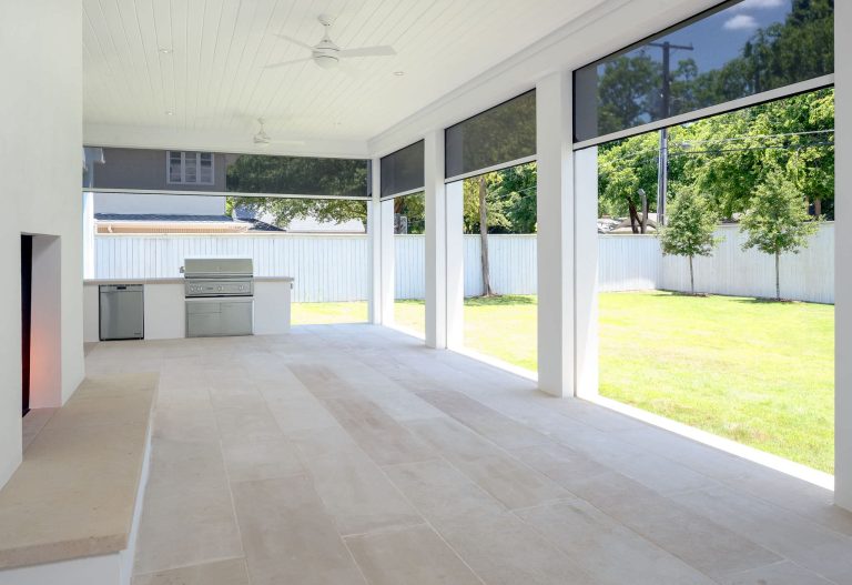 Large minimalist concrete paver screened-in back porch photo in Dallas with a roof extension by Faulkner Perrin Custom Homes | Outdoor Photos | Porch | Landscaping | Landscape Design | Outdoor Living Space | Porch Design Ideas | Outdoor Living Space Ideas | Backyard Design