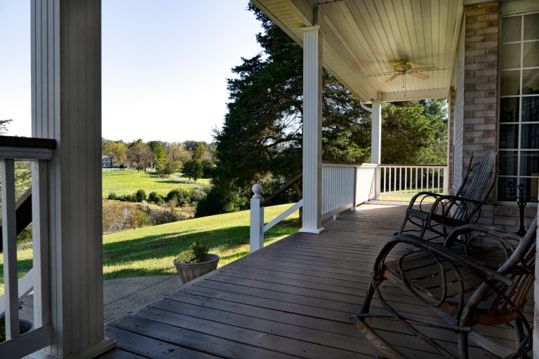Large minimalist front porch photo in DC Metro by Levi Cheff Photography | Outdoor Photos | Porch | Landscaping | Landscape Design | Outdoor Living Space | Porch Design Ideas | Outdoor Living Space Ideas | Backyard Design