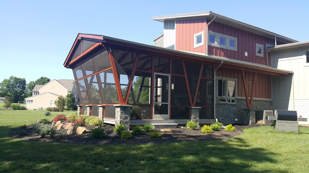 Large minimalist screened-in back porch photo in Philadelphia with a roof extension by Fearn-Clendaniel Architects Inc. | Outdoor Photos | Porch | Landscaping | Landscape Design | Outdoor Living Space | Porch Design Ideas | Outdoor Living Space Ideas | Backyard Design