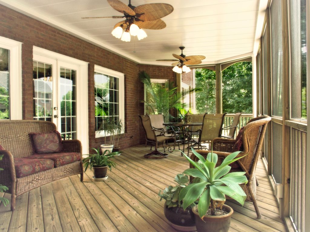 Large minimalist screened-in back porch photo in Seattle with decking and a roof extension by USI Custom Outdoor Living | Outdoor Photos | Porch | Landscaping | Landscape Design | Outdoor Living Space | Porch Design Ideas | Outdoor Living Space Ideas | Backyard Design