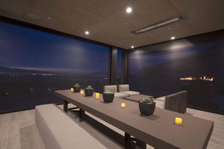 Large minimalist tile back porch idea in Other with a roof extension and a fire pit by Phantom Screens | Outdoor Photos | Porch | Landscaping | Landscape Design | Outdoor Living Space | Porch Design Ideas | Outdoor Living Space Ideas | Backyard Design