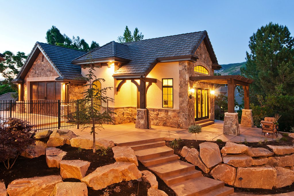 Large mountain style backyard concrete and rectangular natural pool house photo in Salt Lake City