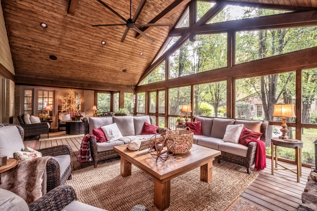 Large mountain style porch photo in Other by Heritage Builders | Outdoor Photos | Porch | Landscaping | Landscape Design | Outdoor Living Space | Porch Design Ideas | Outdoor Living Space Ideas | Backyard Design