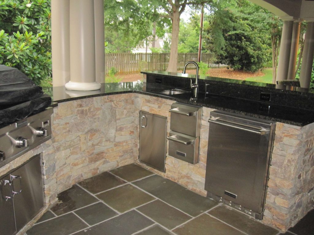 Large mountain style tile porch idea in Other with a roof extension