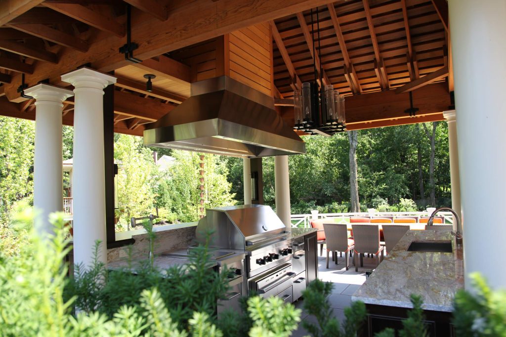 Large porch idea in Boston with a roof extension