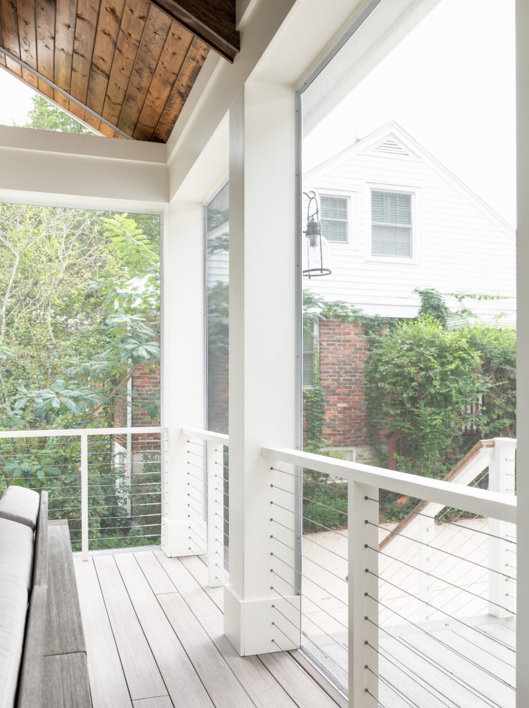 Large transitional back porch idea in Nashville with a fireplace, decking and a roof extension by The Kingston Group - Remodeling Specialists | Outdoor Photos | Porch | Landscaping | Landscape Design | Outdoor Living Space | Porch Design Ideas | Outdoor Living Space Ideas | Backyard Design