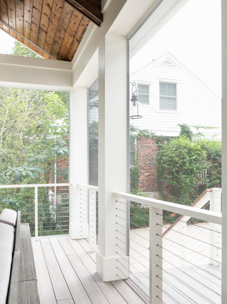 Large transitional back porch idea in Nashville with a fireplace, decking and a roof extension by The Kingston Group - Remodeling Specialists | Outdoor Photos | Porch | Landscaping | Landscape Design | Outdoor Living Space | Porch Design Ideas | Outdoor Living Space Ideas | Backyard Design