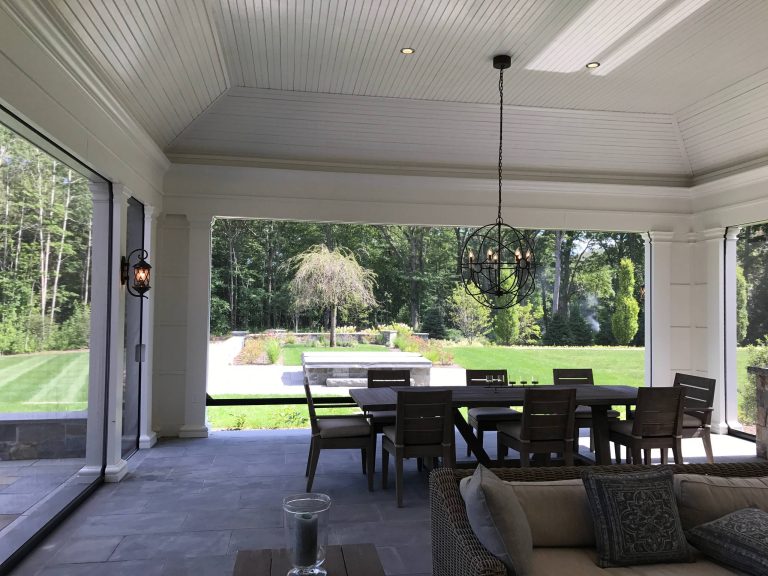 Large transitional backyard tile patio kitchen photo in Boston with a roof extension