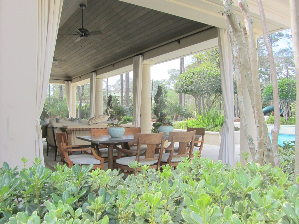 Large transitional backyard tile patio kitchen photo in Houston with a roof extension