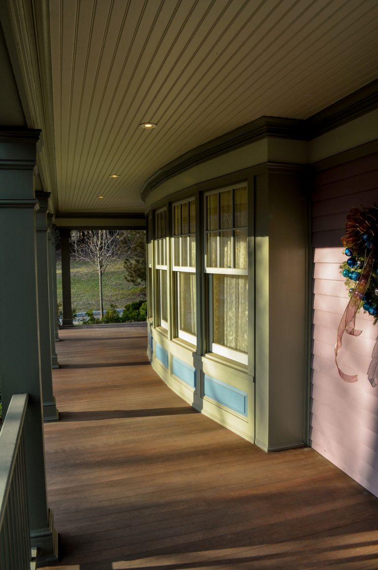 Large transitional front porch photo in New York with decking and a roof extension by Patrick M. Croke, Architect | Outdoor Photos | Porch | Landscaping | Landscape Design | Outdoor Living Space | Porch Design Ideas | Outdoor Living Space Ideas | Backyard Design