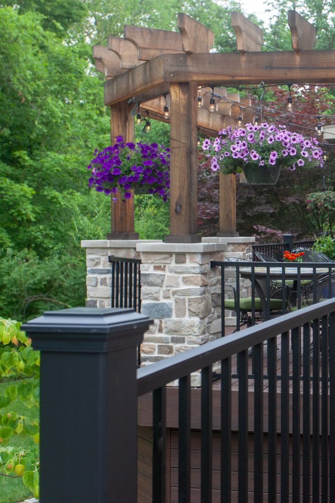 Large transitional screened-in back porch photo in Cincinnati with decking and a roof extension by Legacy Builders Group | Outdoor Photos | Porch | Landscaping | Landscape Design | Outdoor Living Space | Porch Design Ideas | Outdoor Living Space Ideas | Backyard Design