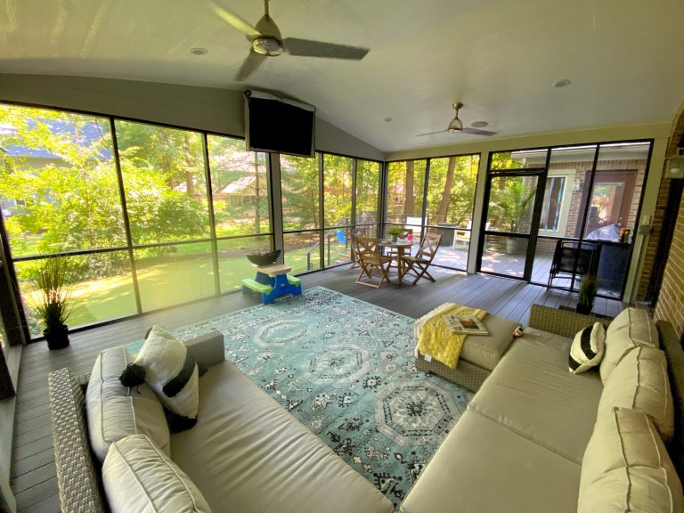 Large transitional screened-in back porch photo in Indianapolis with a roof extension by Fiano Landscapes | Outdoor Photos | Porch | Landscaping | Landscape Design | Outdoor Living Space | Porch Design Ideas | Outdoor Living Space Ideas | Backyard Design