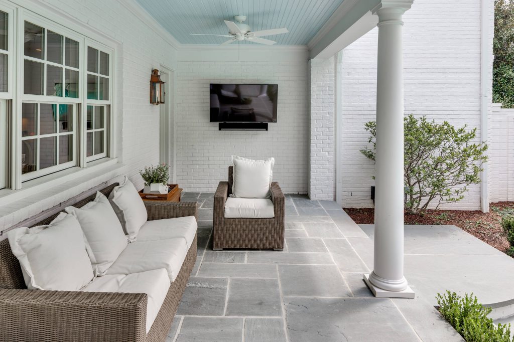 Large transitional stone back porch photo in Nashville with a roof extension by CDP Architecture, LLC | Outdoor Photos | Porch | Landscaping | Landscape Design | Outdoor Living Space | Porch Design Ideas | Outdoor Living Space Ideas | Backyard Design