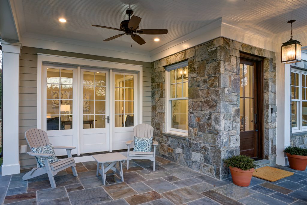 Large transitional tile front porch idea in DC Metro with a roof extension by Laurence Cafritz Builders | Outdoor Photos | Porch | Landscaping | Landscape Design | Outdoor Living Space | Porch Design Ideas | Outdoor Living Space Ideas | Backyard Design