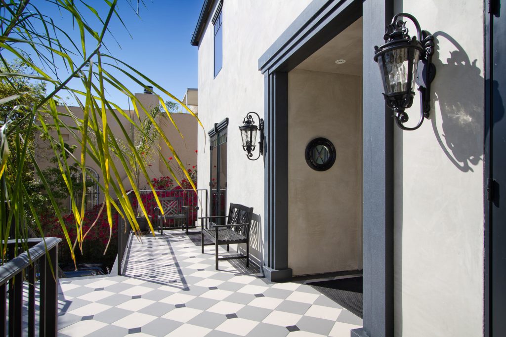 Large transitional tile front porch idea in Los Angeles by Milano Granite | Outdoor Photos | Porch | Landscaping | Landscape Design | Outdoor Living Space | Porch Design Ideas | Outdoor Living Space Ideas | Backyard Design