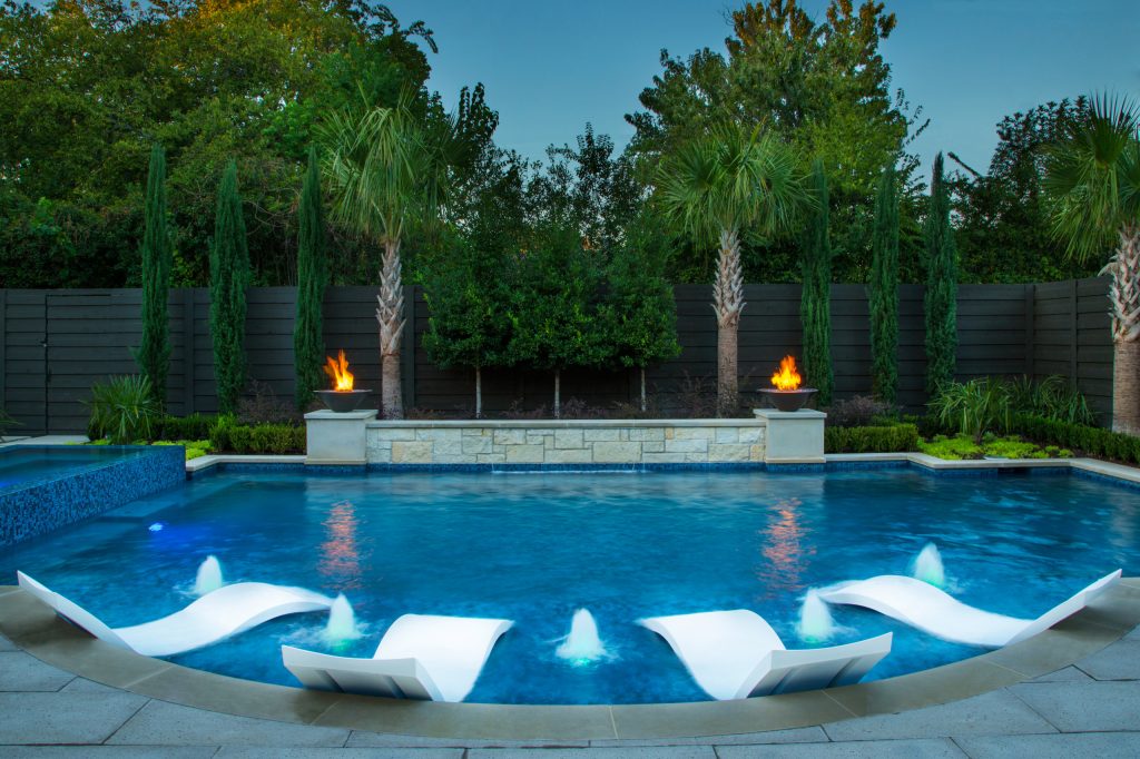 Large trendy backyard custom-shaped lap hot tub photo in Houston