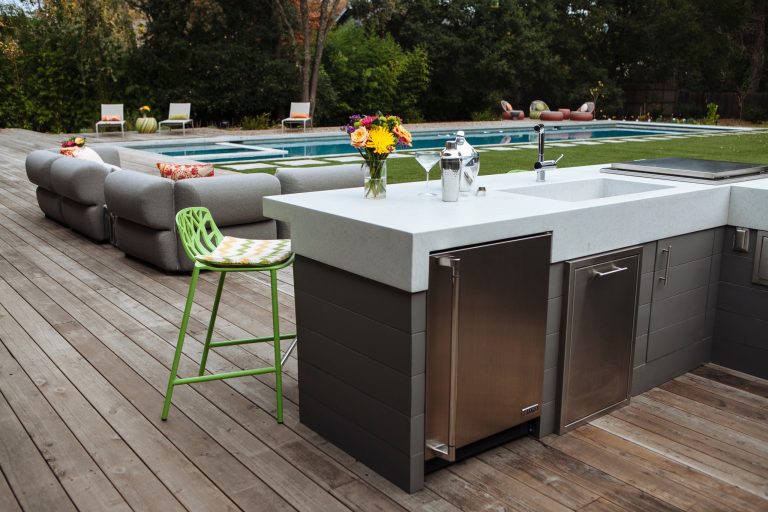 Large trendy backyard outdoor kitchen deck photo in San Francisco with no cover