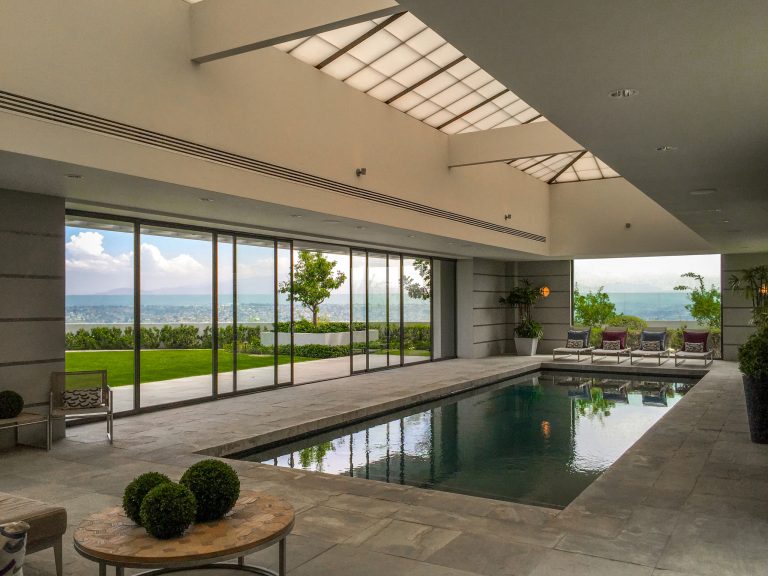 Large trendy indoor tile and rectangular lap pool photo in San Diego
