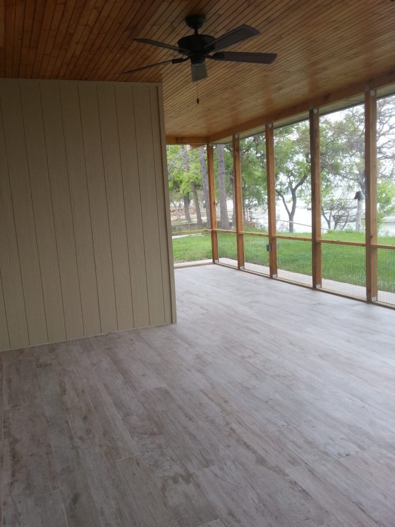 Large trendy screened-in back porch photo in Dallas with a roof extension by Brownwood Decorating | Outdoor Photos | Porch | Landscaping | Landscape Design | Outdoor Living Space | Porch Design Ideas | Outdoor Living Space Ideas | Backyard Design