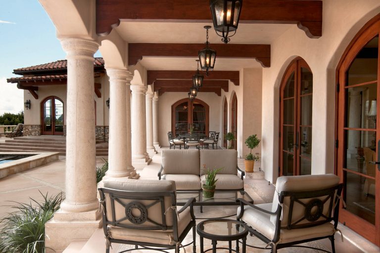 Large tuscan stone back porch photo in San Diego with a roof extension by IS Architecture | Outdoor Photos | Porch | Landscaping | Landscape Design | Outdoor Living Space | Porch Design Ideas | Outdoor Living Space Ideas | Backyard Design