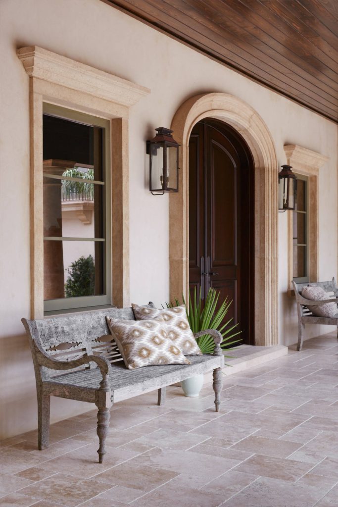 Large tuscan tile front porch photo in Jacksonville with a roof extension by Aurora Builders | Outdoor Photos | Porch | Landscaping | Landscape Design | Outdoor Living Space | Porch Design Ideas | Outdoor Living Space Ideas | Backyard Design
