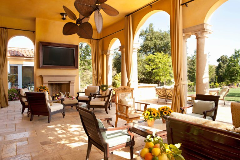 Large tuscan tile porch idea in Los Angeles with a roof extension by Biglin Architectural Group | Outdoor Photos | Porch | Landscaping | Landscape Design | Outdoor Living Space | Porch Design Ideas | Outdoor Living Space Ideas | Backyard Design