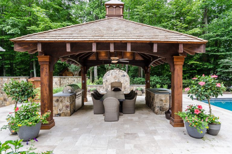 Louvered panel cupola with copper cap on rustic pergola. Trimmed out heavy Cedar posts.