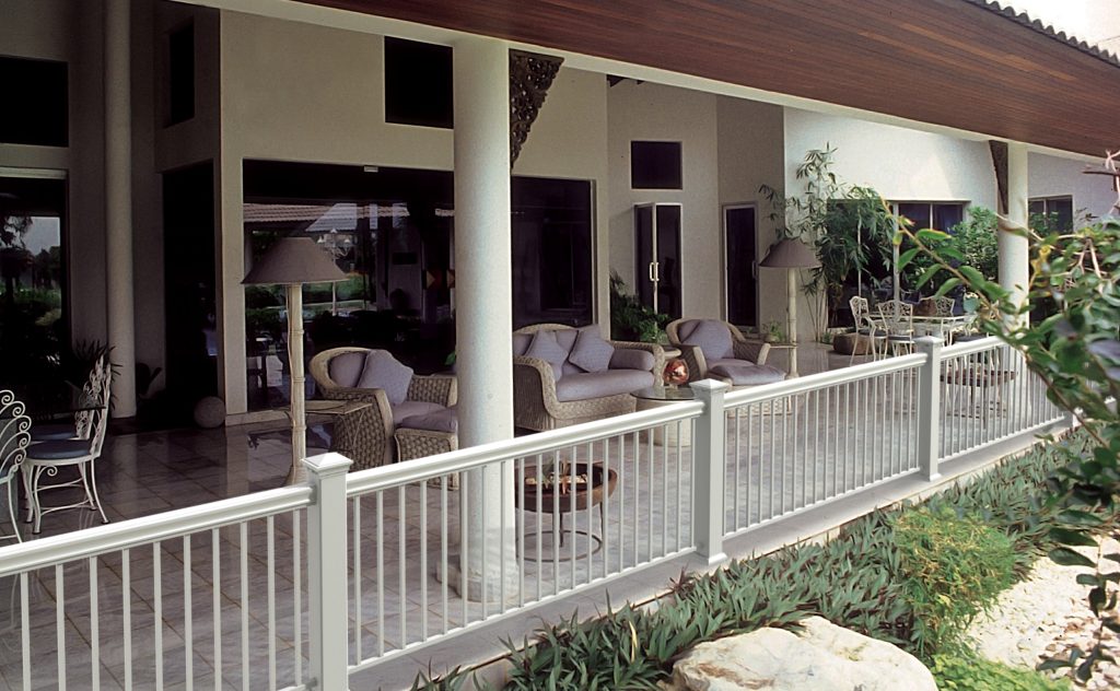 Low-maintenance porch railing combines white aluminum balusters and vinyl posts and top rail. Veranda railing built by Barrette and manufactured exclusively for The Home Depot. by User | Outdoor Photos | Porch | Landscaping | Landscape Design | Outdoor Living Space | Porch Design Ideas | Outdoor Living Space Ideas | Backyard Design