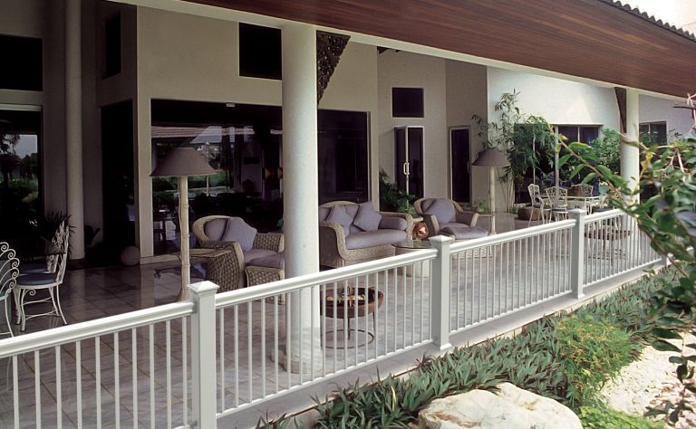 Low-maintenance porch railing combines white aluminum balusters and vinyl posts and top rail. Veranda railing built by Barrette and manufactured exclusively for The Home Depot. by User | Outdoor Photos | Porch | Landscaping | Landscape Design | Outdoor Living Space | Porch Design Ideas | Outdoor Living Space Ideas | Backyard Design
