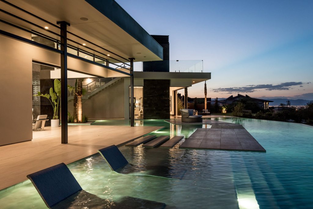 Custom Pool with Glass and Solid Stone Water Chaise