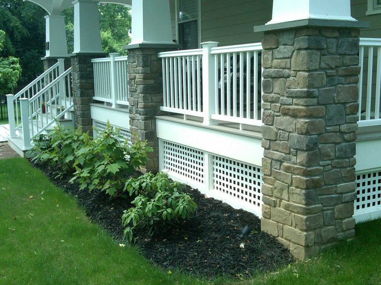 Manufactured stone columns with flagstone caps