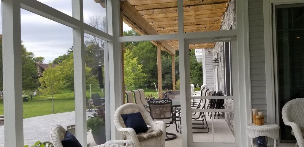 Many opportunities to enjoy the spacious outdoor spaces of the screen porch and adjoining patio.